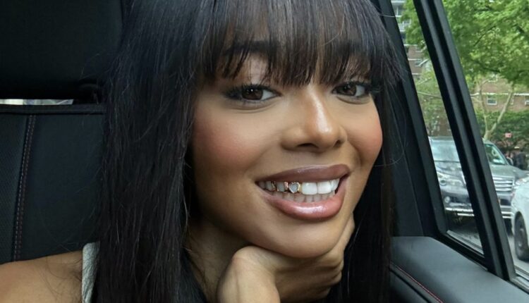skai jackson seated in car